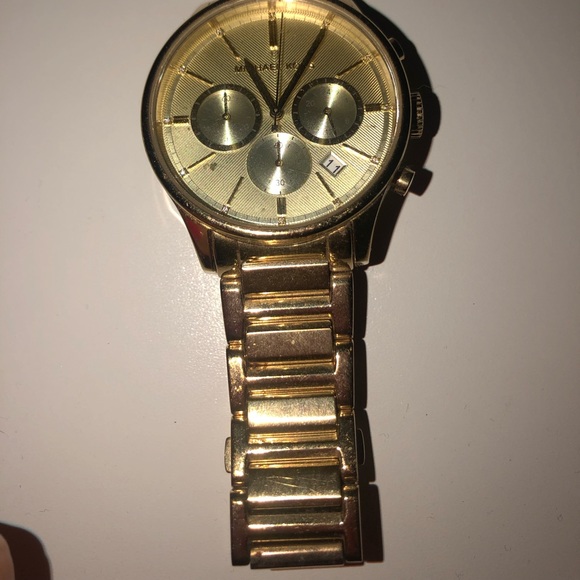 Gold Michael kors round face women’s watch